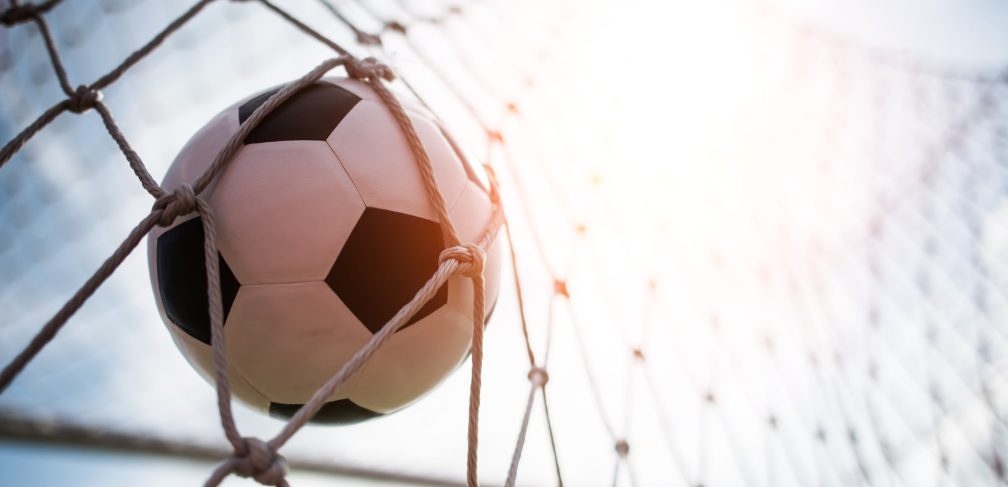 Soccer into goal success concept